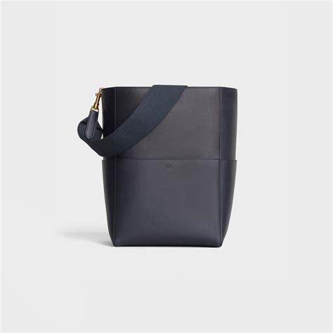 celine sangle navy|SANGLE BUCKET BAG IN NATURAL CALFSKIN .